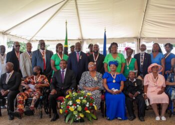 PM Terrance Drew greets Companion of Star of Merit, Medal of Honour awardees