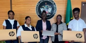 St Kitts and Nevis HC Kevin Isaac donates laptops to CFBC students