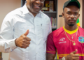 PM Roosevelt Skerrit greets Alick Athanaze on his selection to West Indies test side