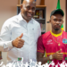 PM Roosevelt Skerrit greets Alick Athanaze on his selection to West Indies test side